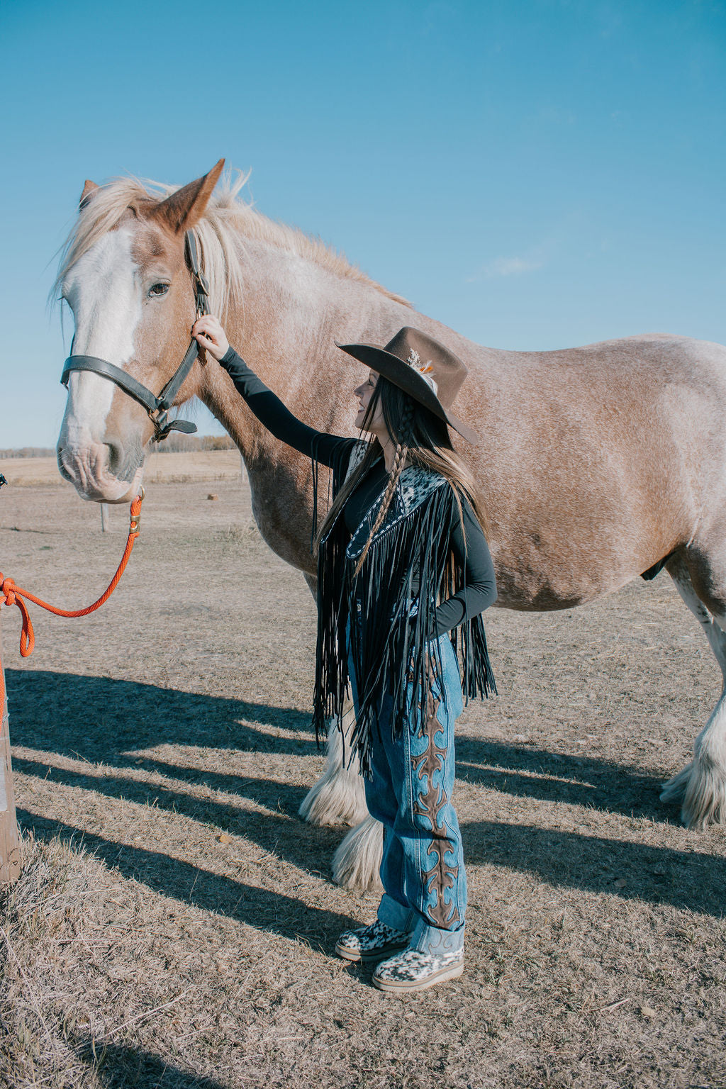 Handtooled hide fringe shawl black