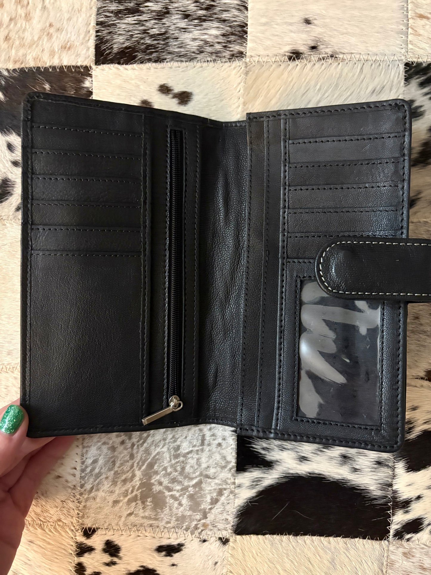 Handtooled leather wallet