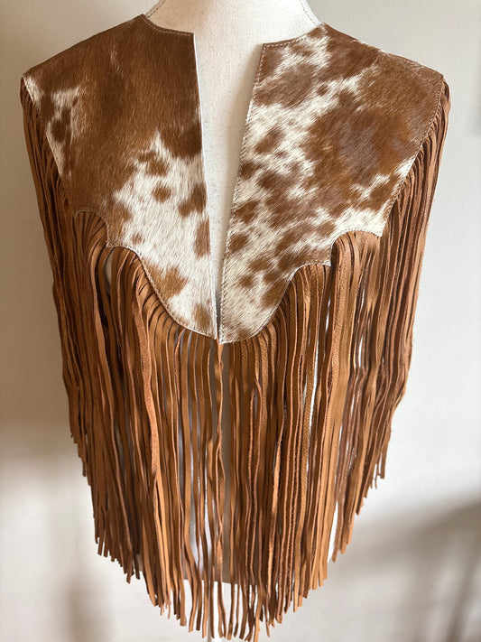 The fringe cape in tan