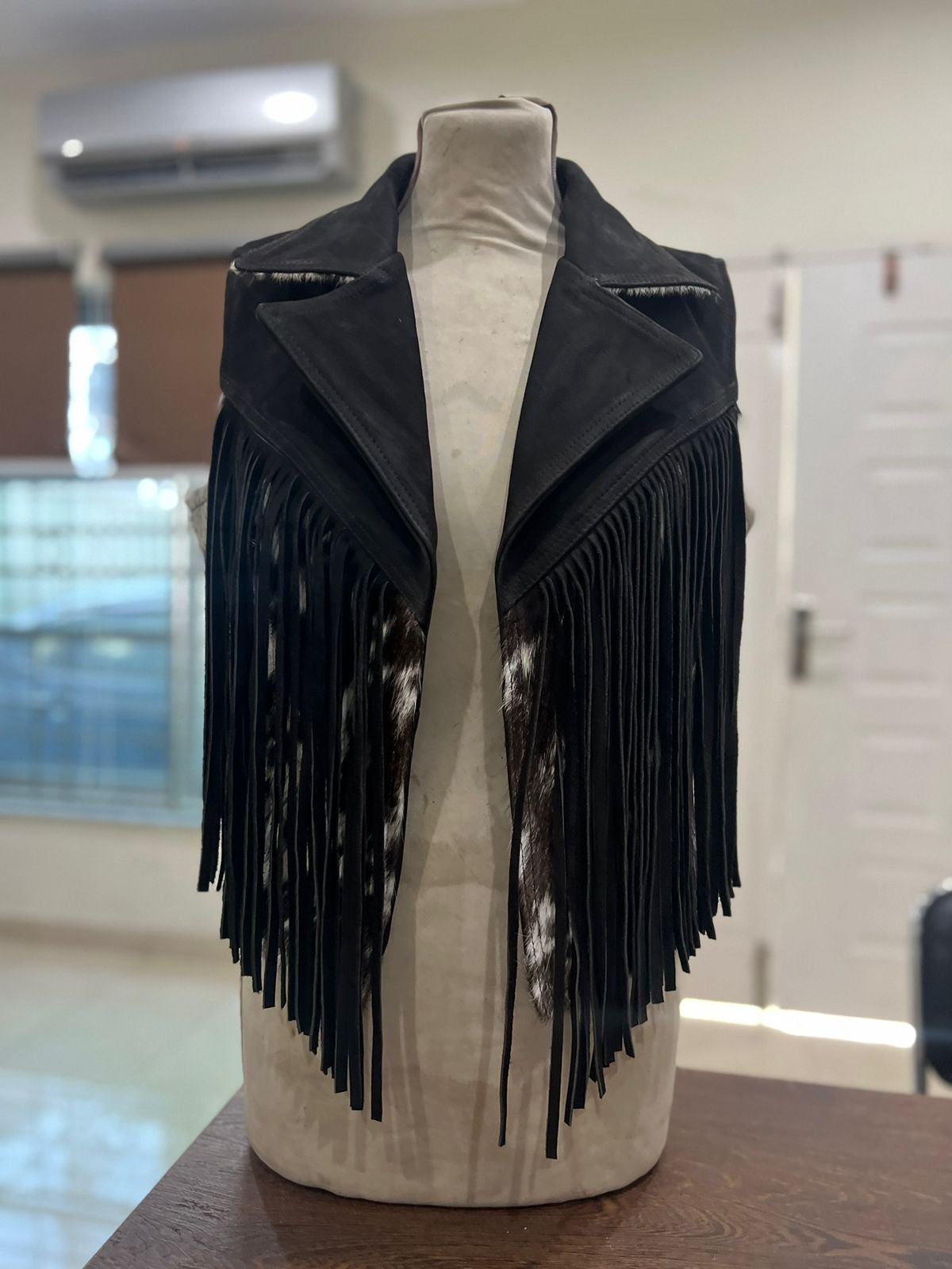 Cowhide fringe vest medium