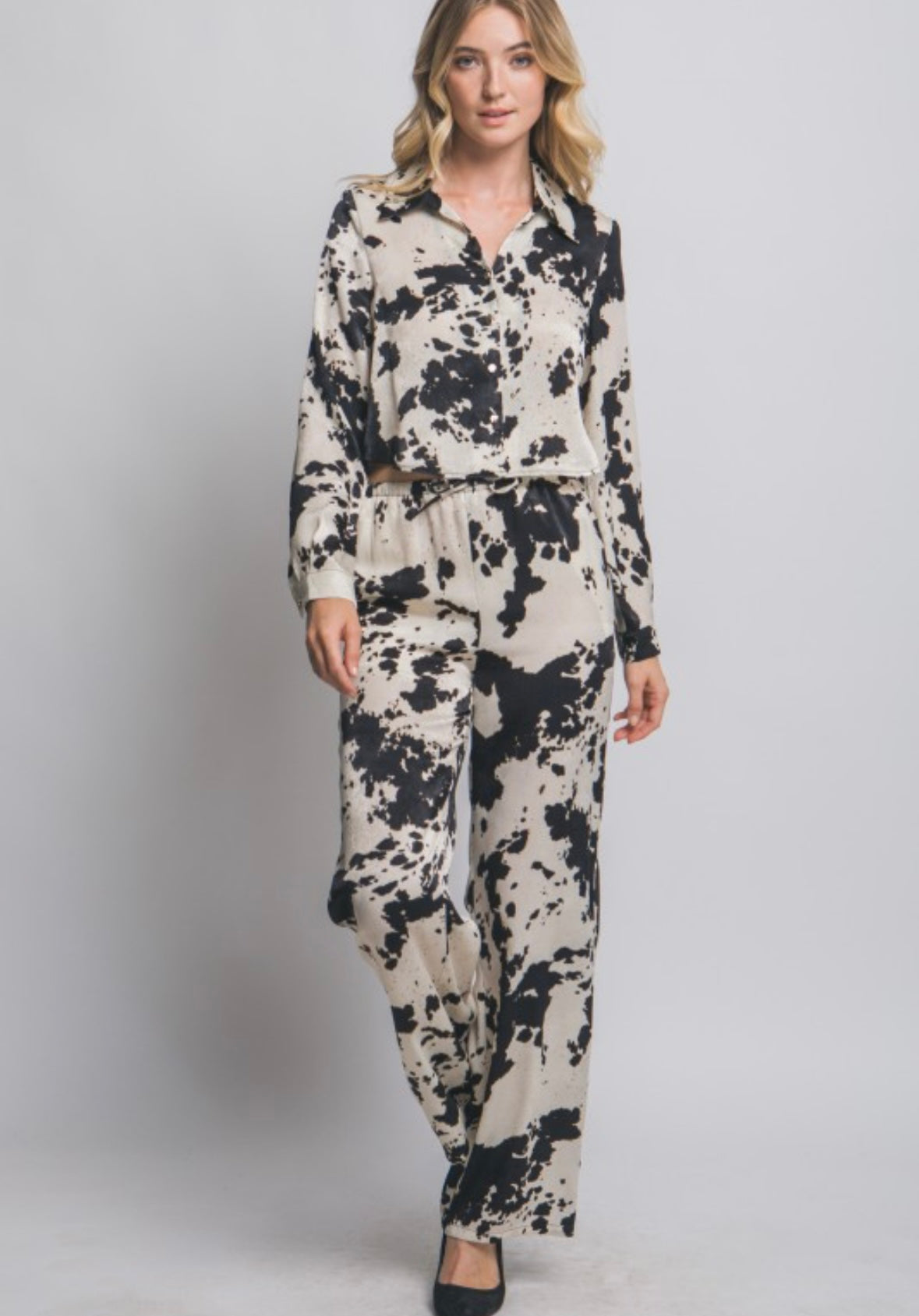 Cow print pants in black