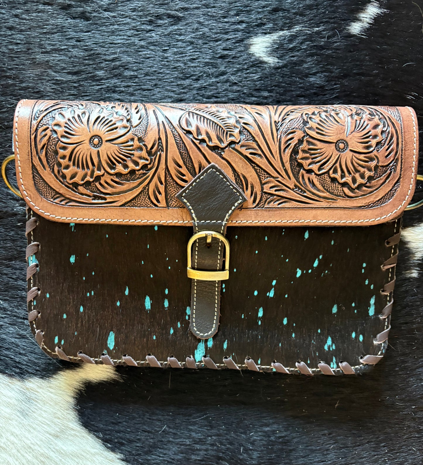 Iceberg bag turquoise flakes on hide black or white