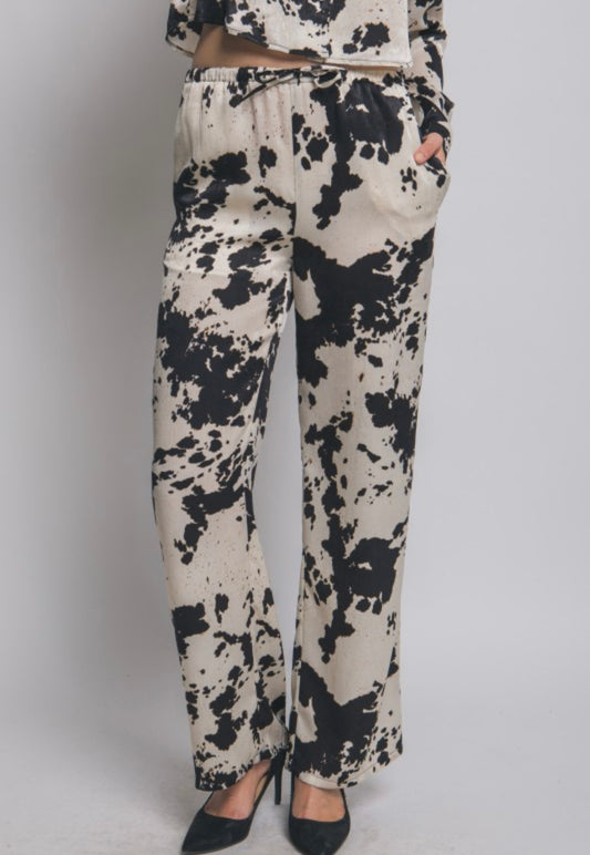 Cow print pants in black
