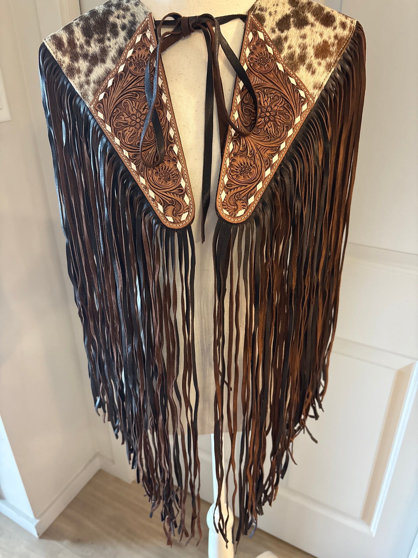 Handtooled hide fringe shawl brown