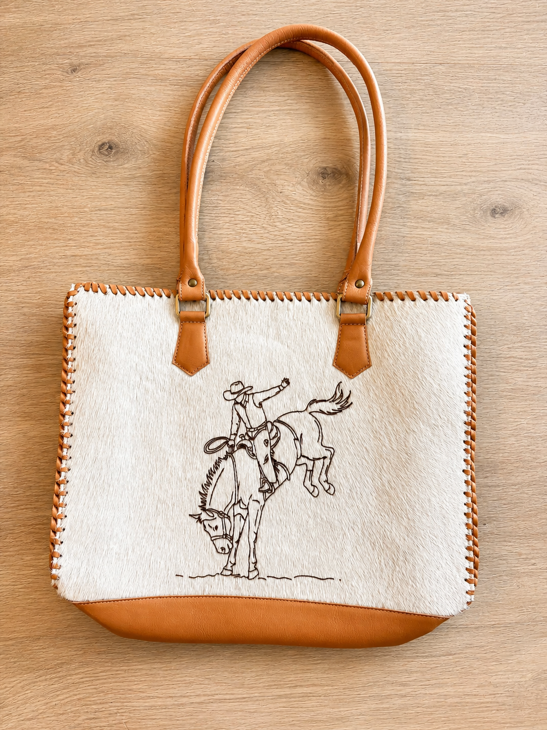 Rodeo Spirit Cowhide Tote in tan