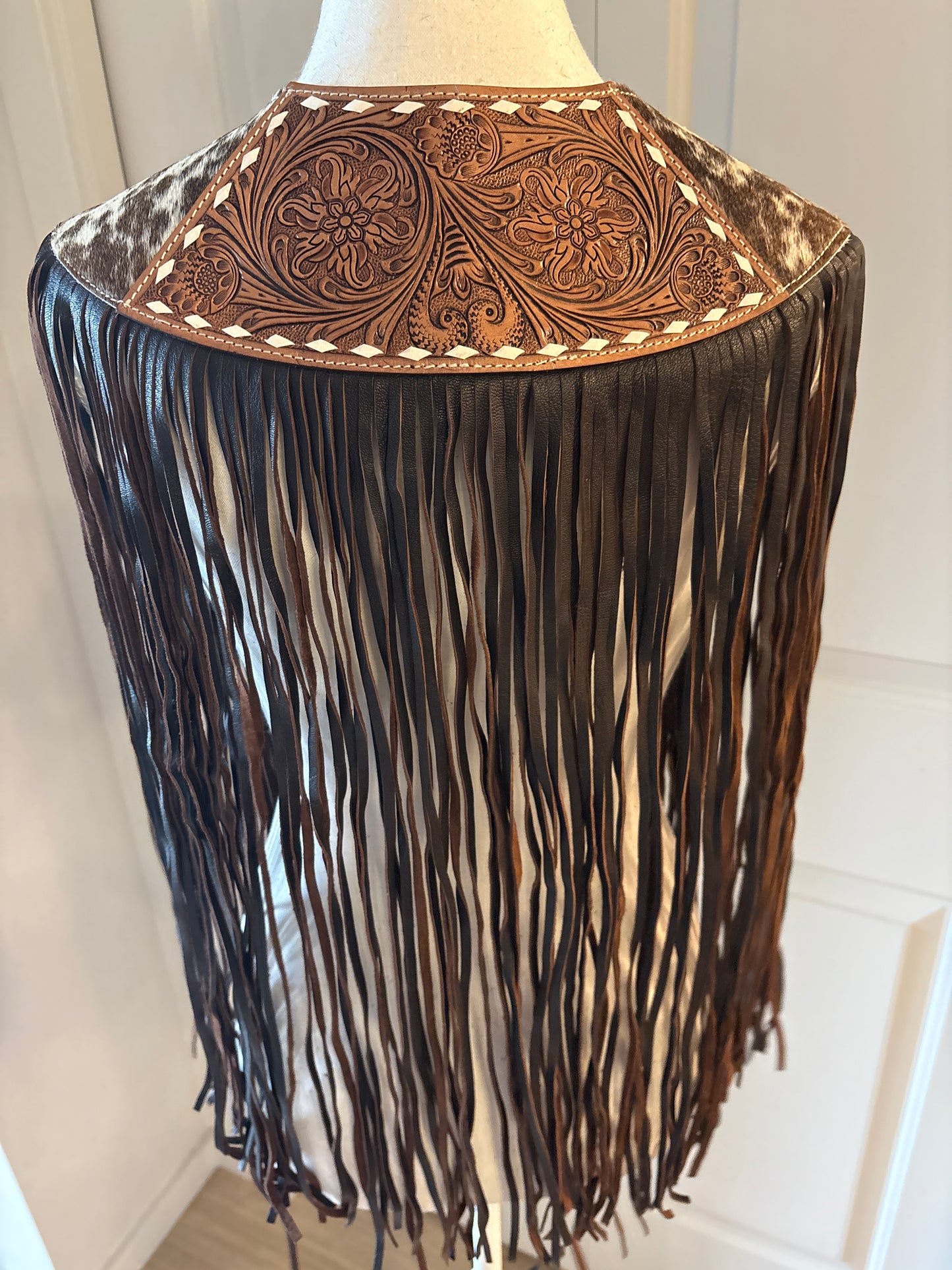 Handtooled hide fringe shawl brown