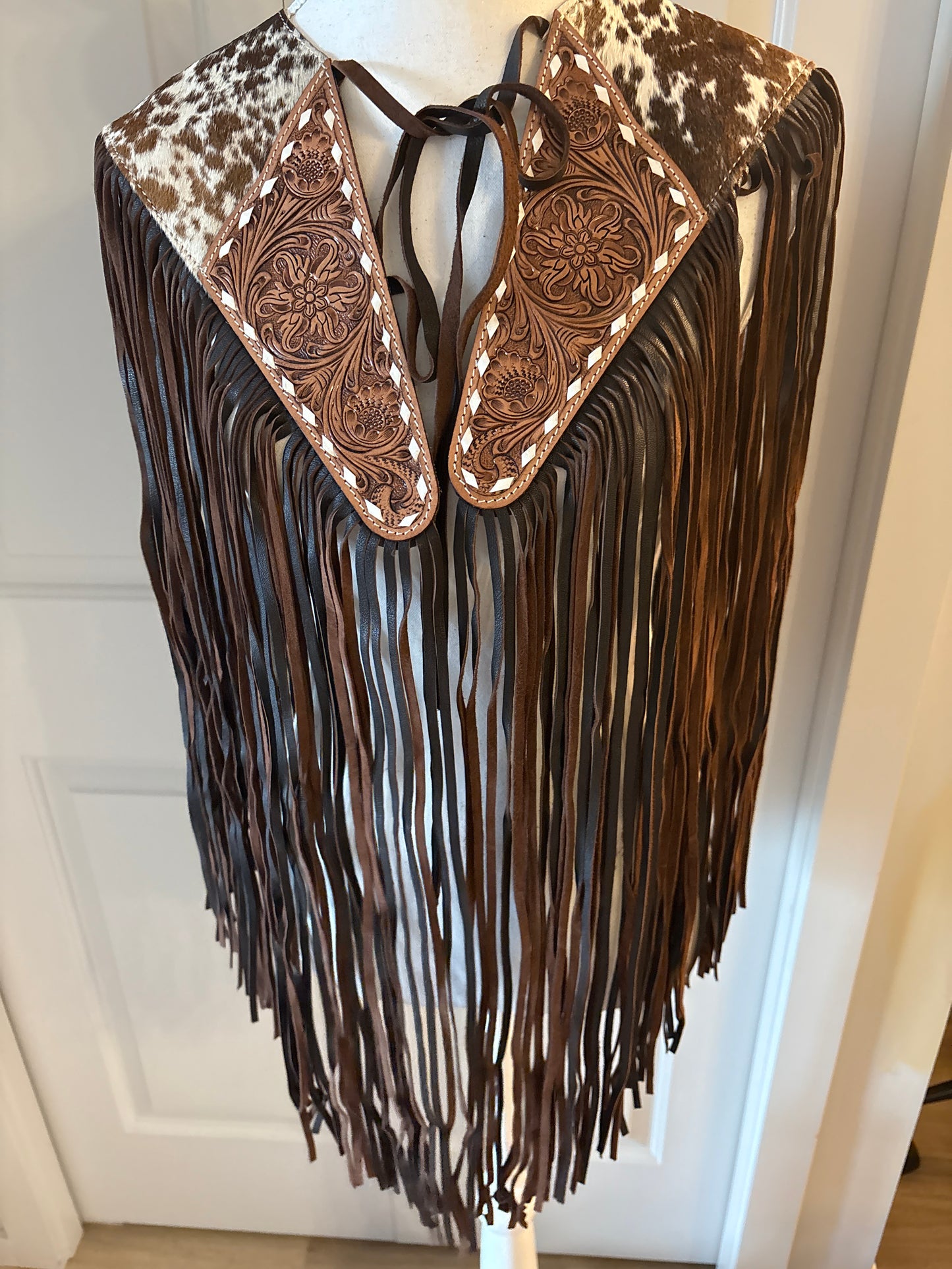 Handtooled hide fringe shawl brown