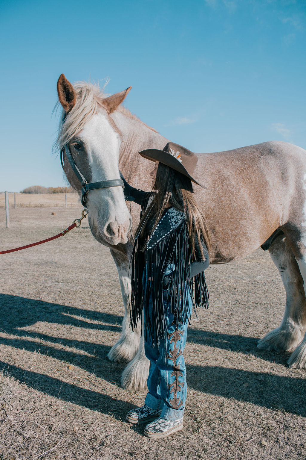 Handtooled hide fringe shawl black