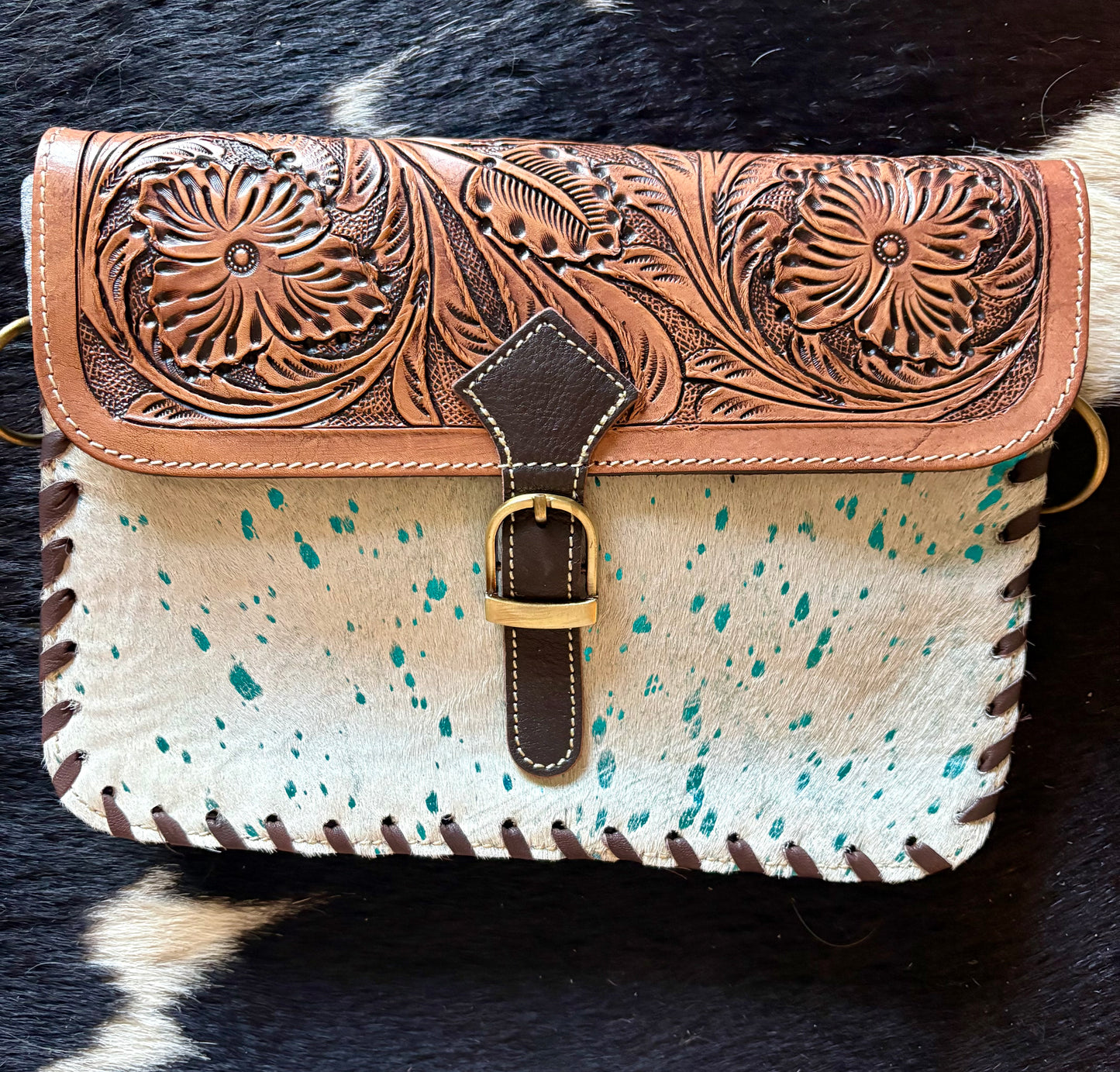 Iceberg bag turquoise flakes on hide black or white