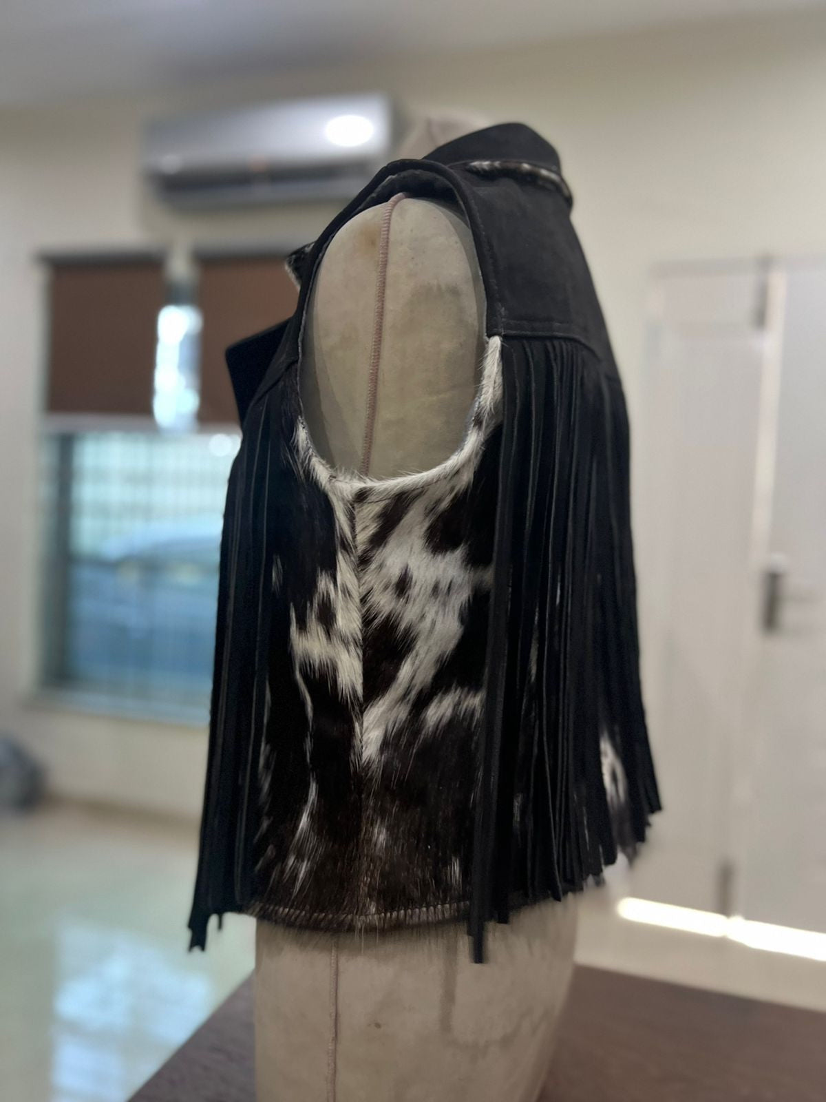 Cowhide fringe vest medium