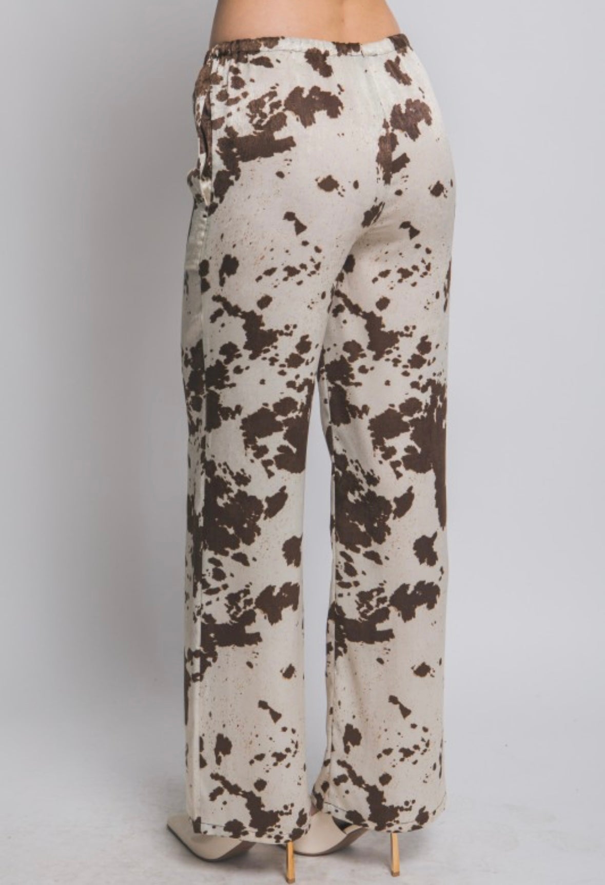 Cow print pants in brown