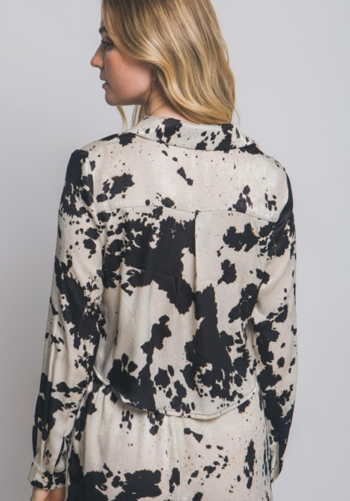 Cow print crop blouse in black