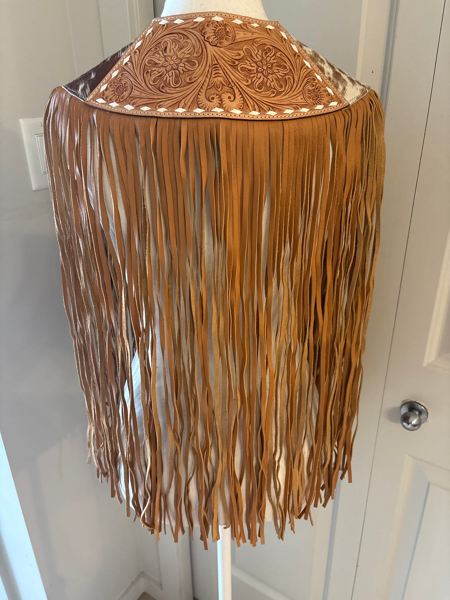 Handtooled hide fringe shawl tan