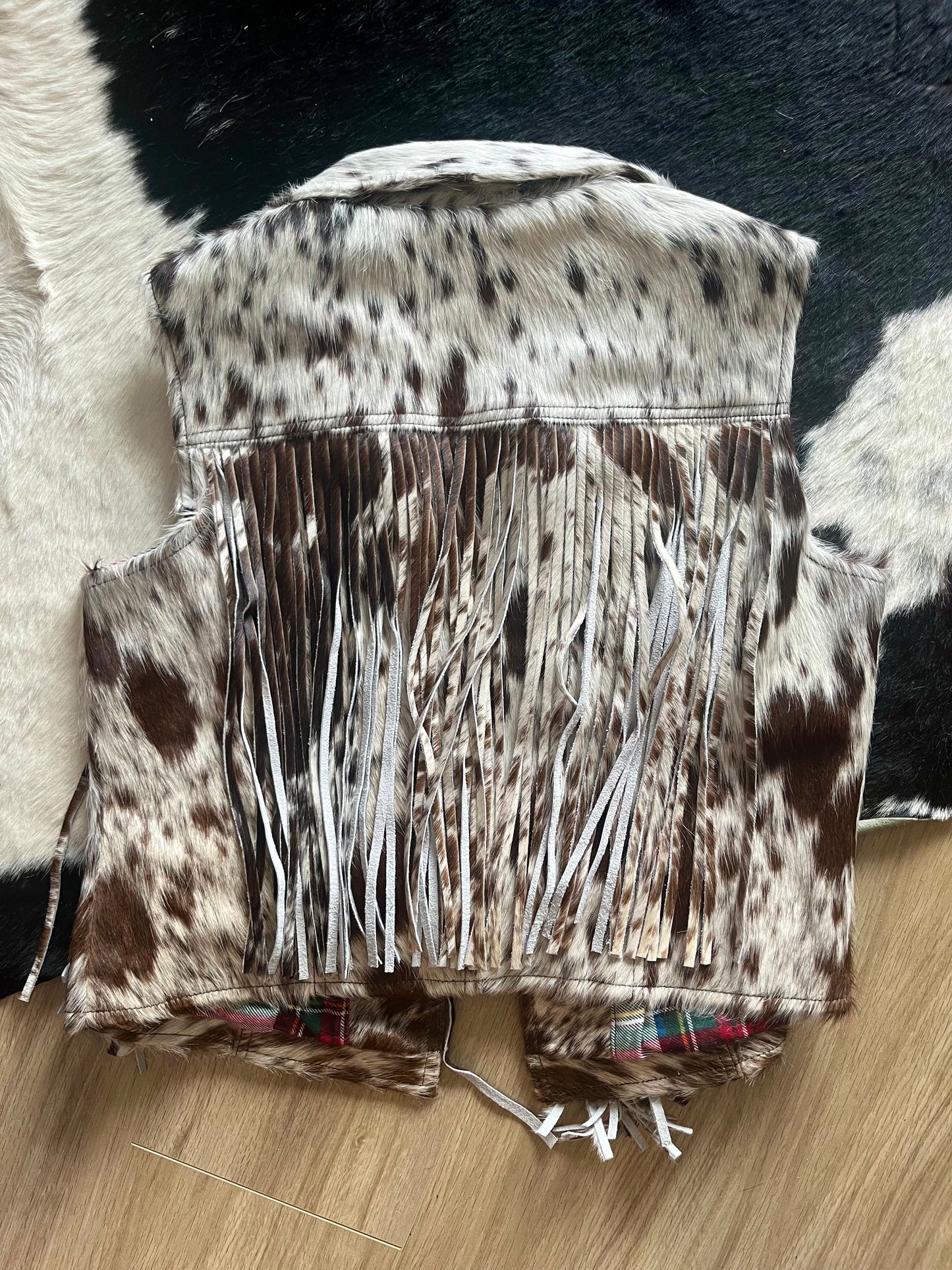 Cowhide fringe vest large