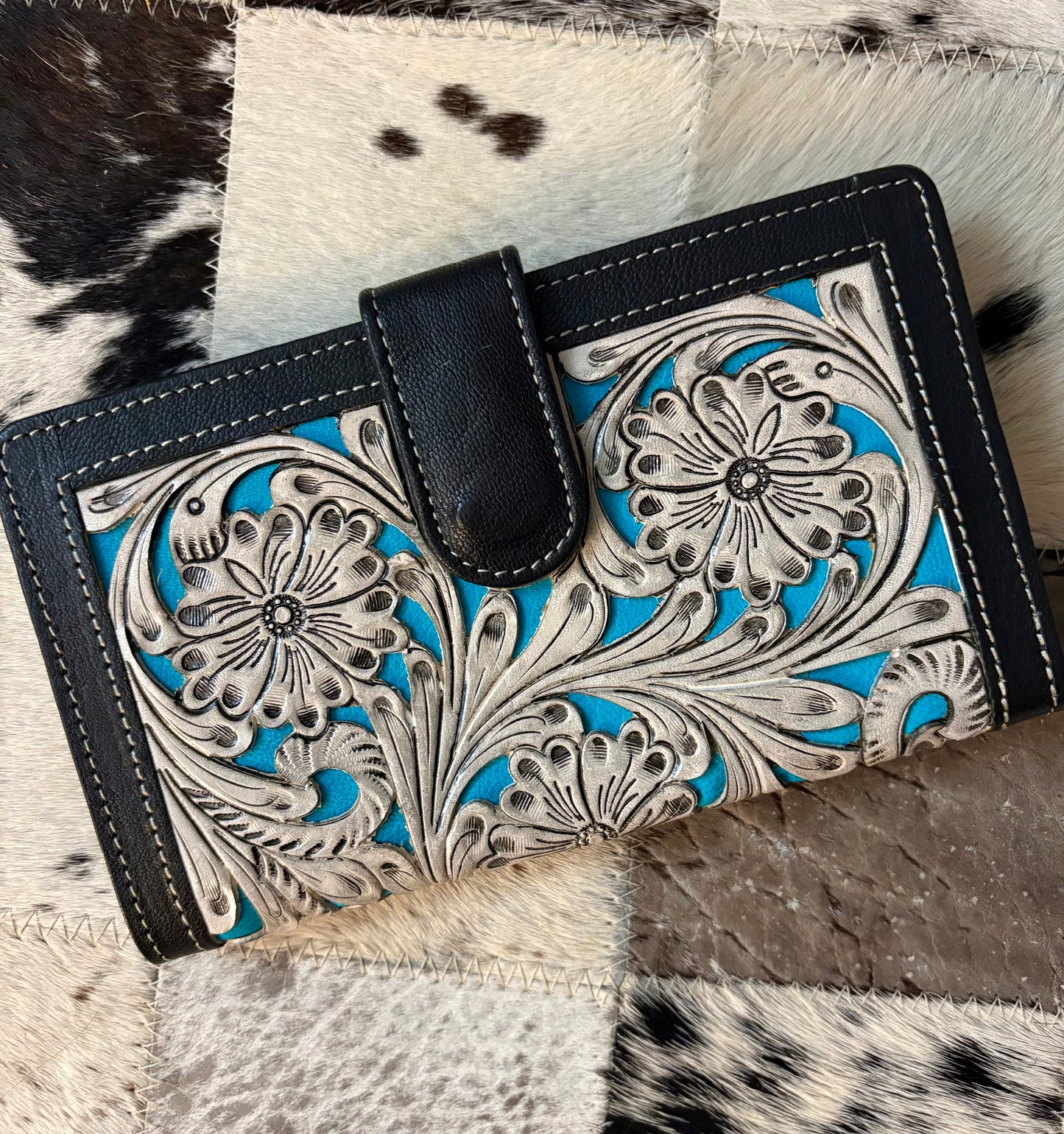 Handtooled leather wallet