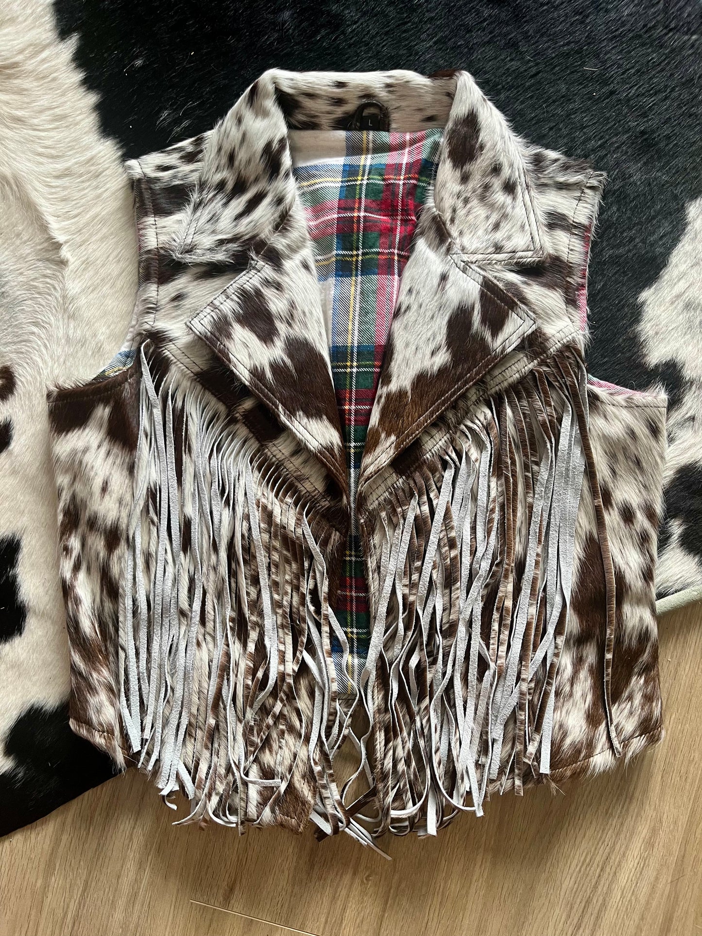 Cowhide fringe vest large