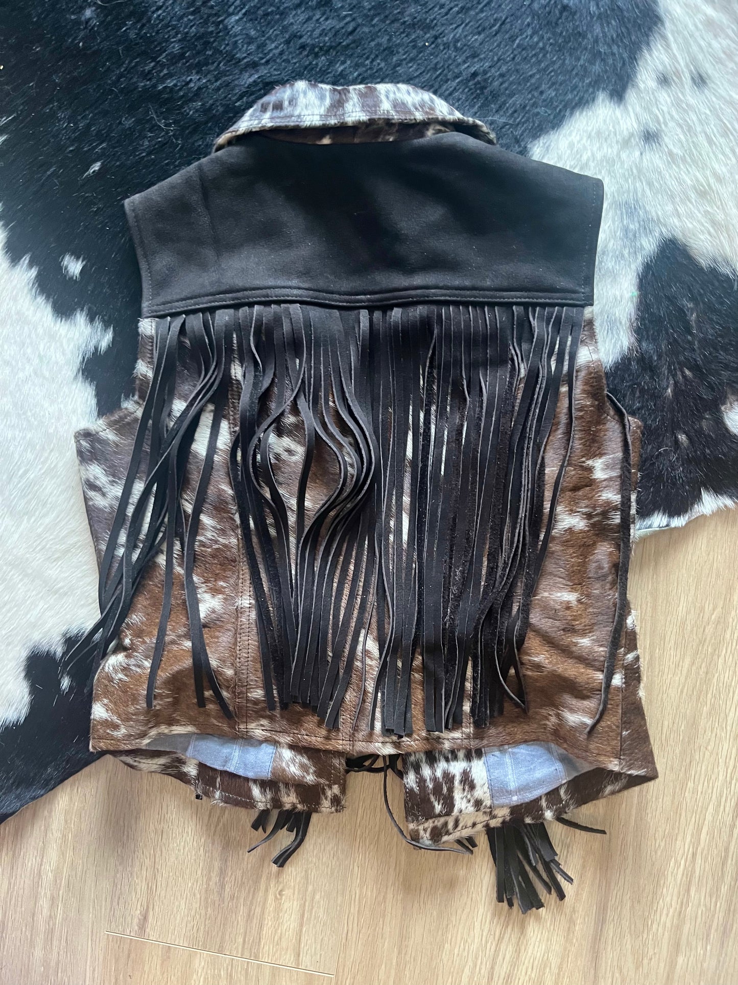 Cowhide fringe vest small